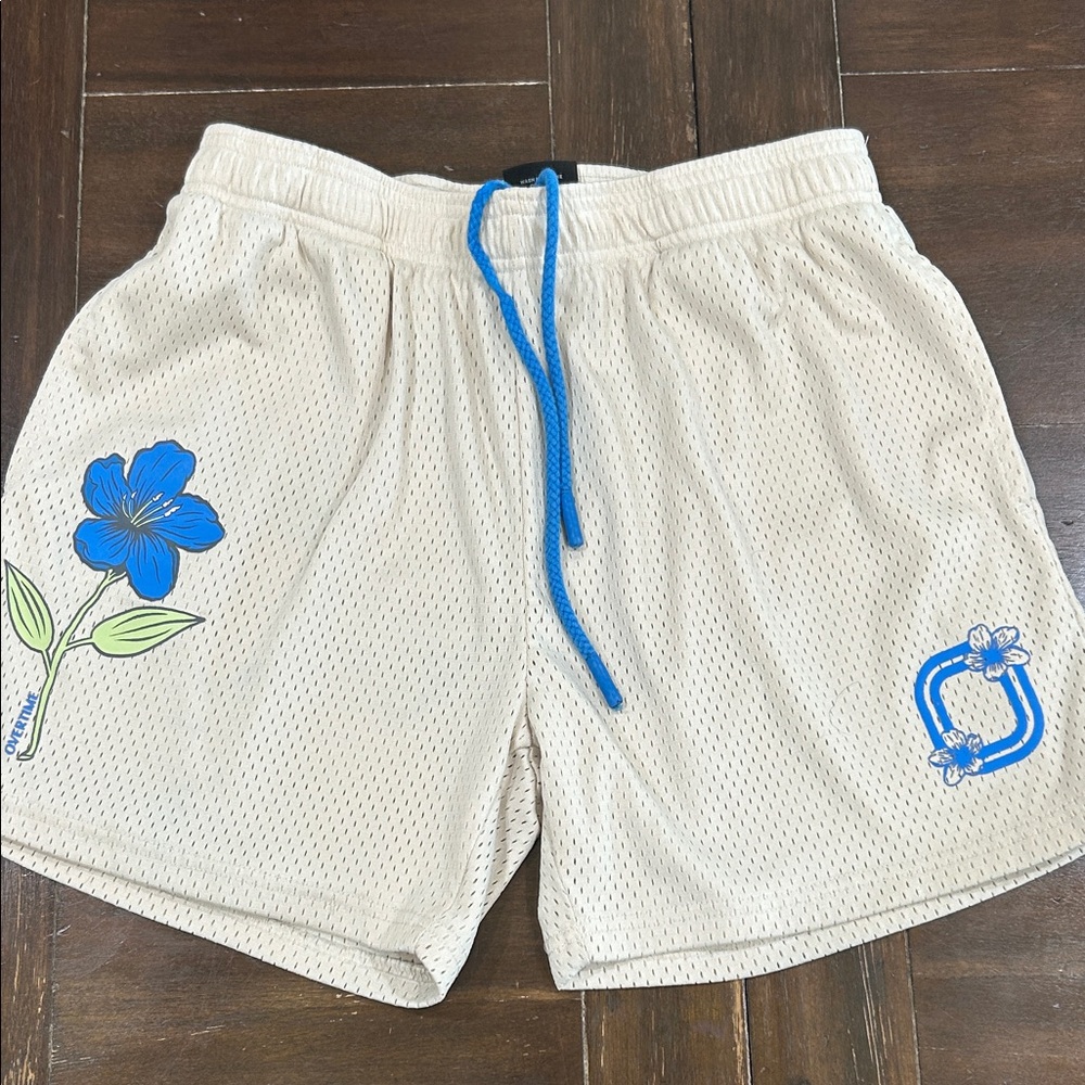 OVERTIME Men's Cream Athletic Mesh Shorts with Blue Floral Accents